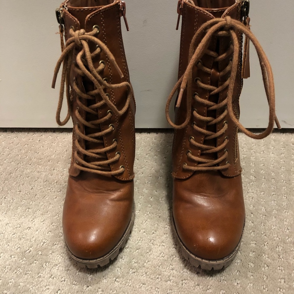 Brown heeled lace up boots